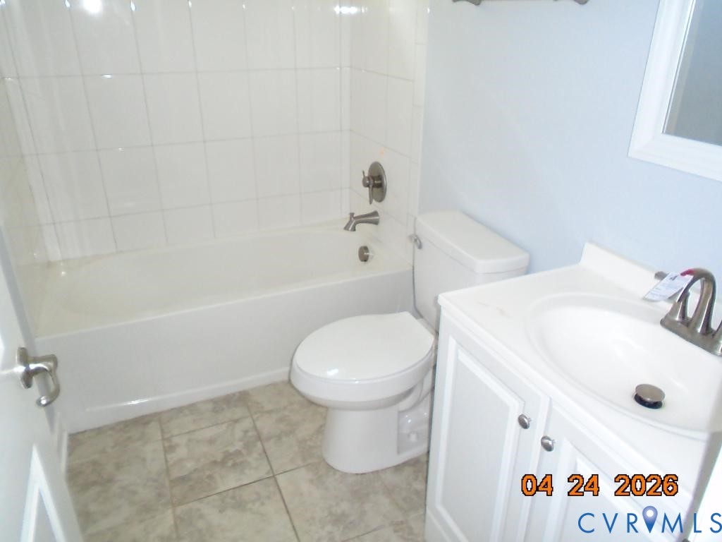 2707 Berry Road Richmond, VA 23234 - Photo 8 of 16 Bathroom featuring a white vanity with integrated