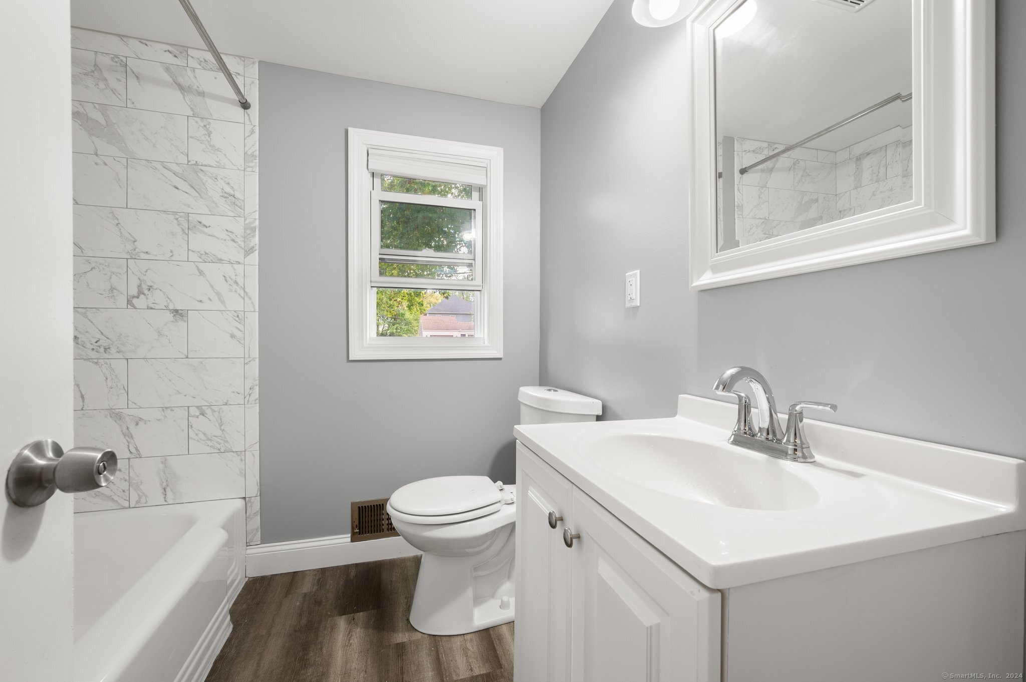 21 Davis Road East Hartford, CT 06118 - Photo 7 of 21 a bathroom with a sink toilet and shower