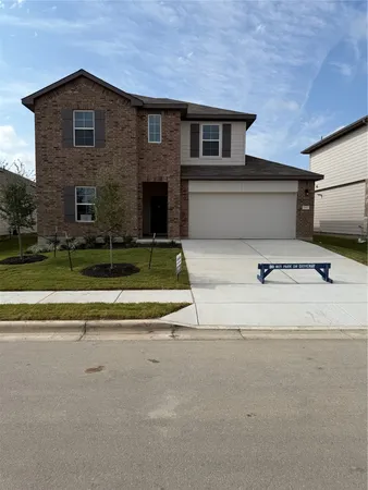 a view of backyard of a house