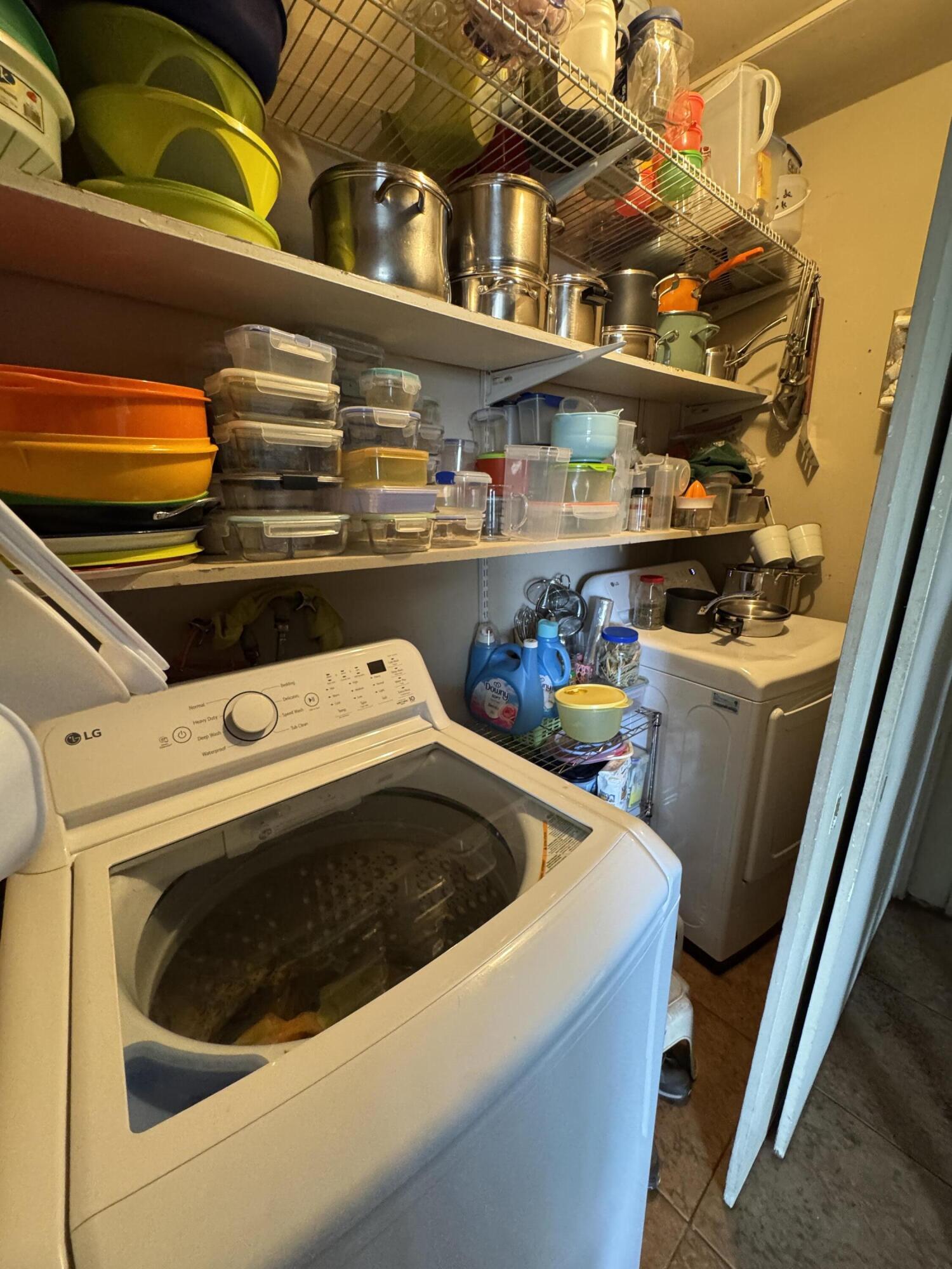 704 North Floral Street Visalia, CA 93291 - Photo 16 of 51 a utility room with dryer and washer