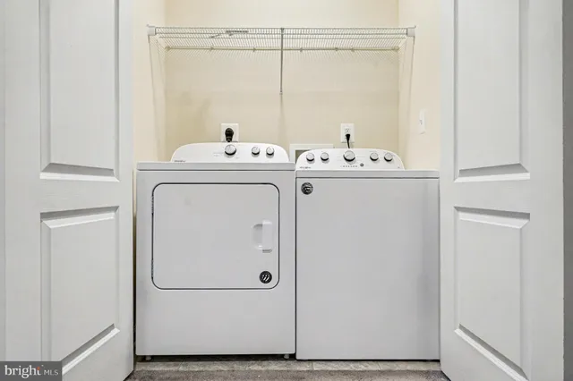 a view of a house with wooden deck