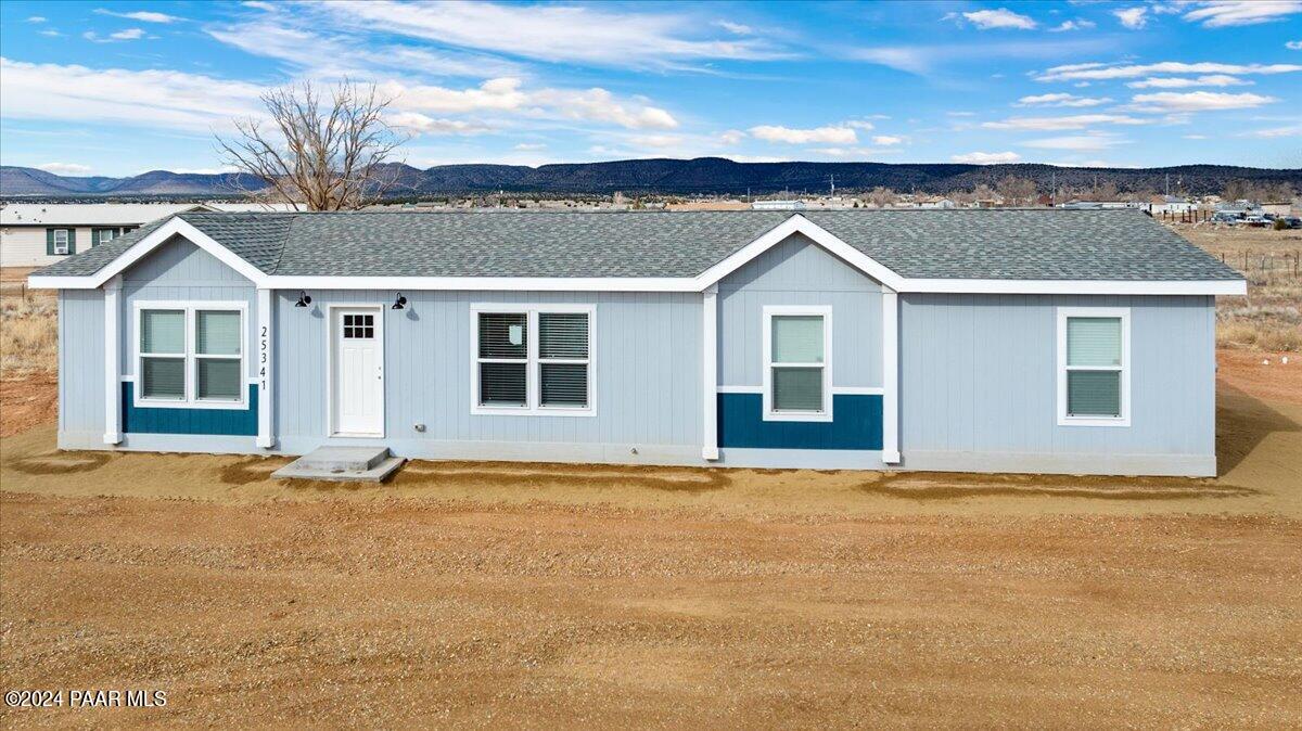 25341 North Mitchell Road Paulden, AZ 86334 - Photo 1 of 17 front view of a house with a yard