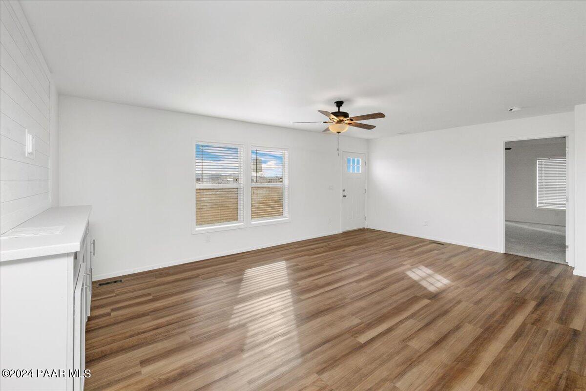 25341 North Mitchell Road Paulden, AZ 86334 - Photo 3 of 17 a view of empty room with wooden floor