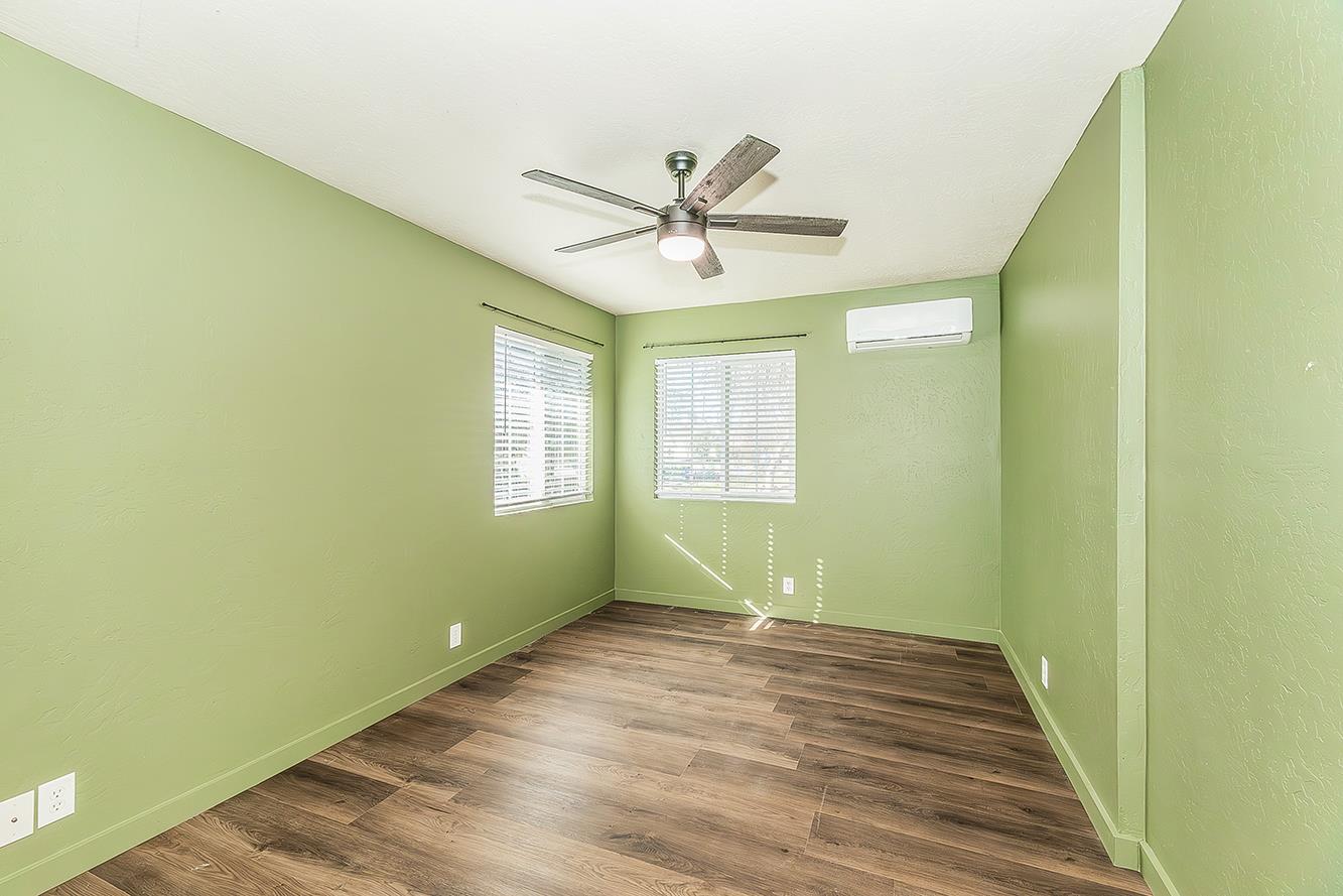 34664 Wilson Road Auberry, CA 93602 - Photo 16 of 35 a view of a room with a window and wooden floor