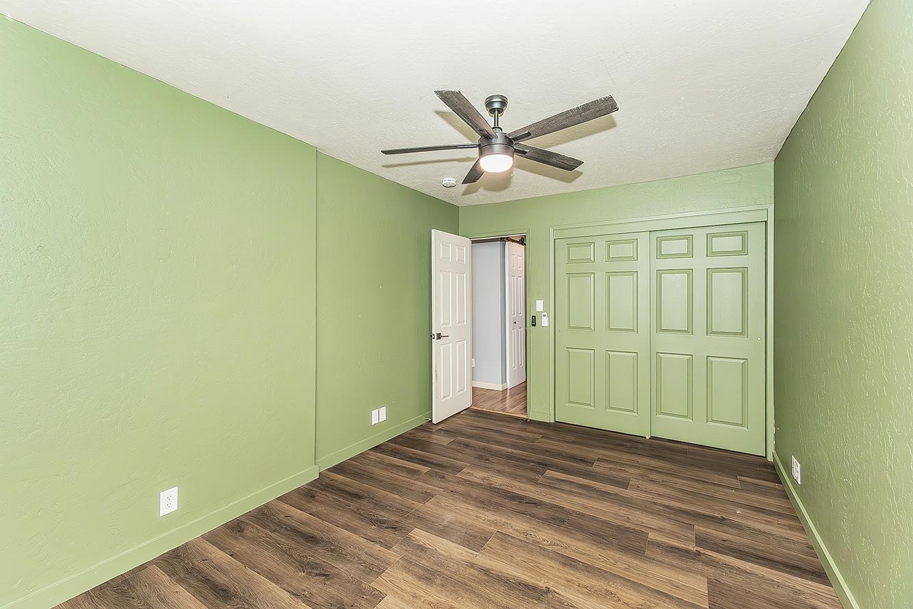 34664 Wilson Road Auberry, CA 93602 - Photo 18 of 35 a view of a big room with wooden floor and closet