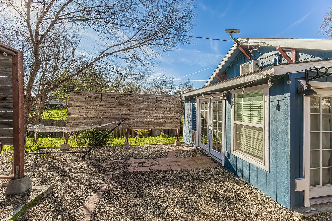 34664 Wilson Road Auberry, CA 93602 - Photo 4 of 35 a view of a house with large windows