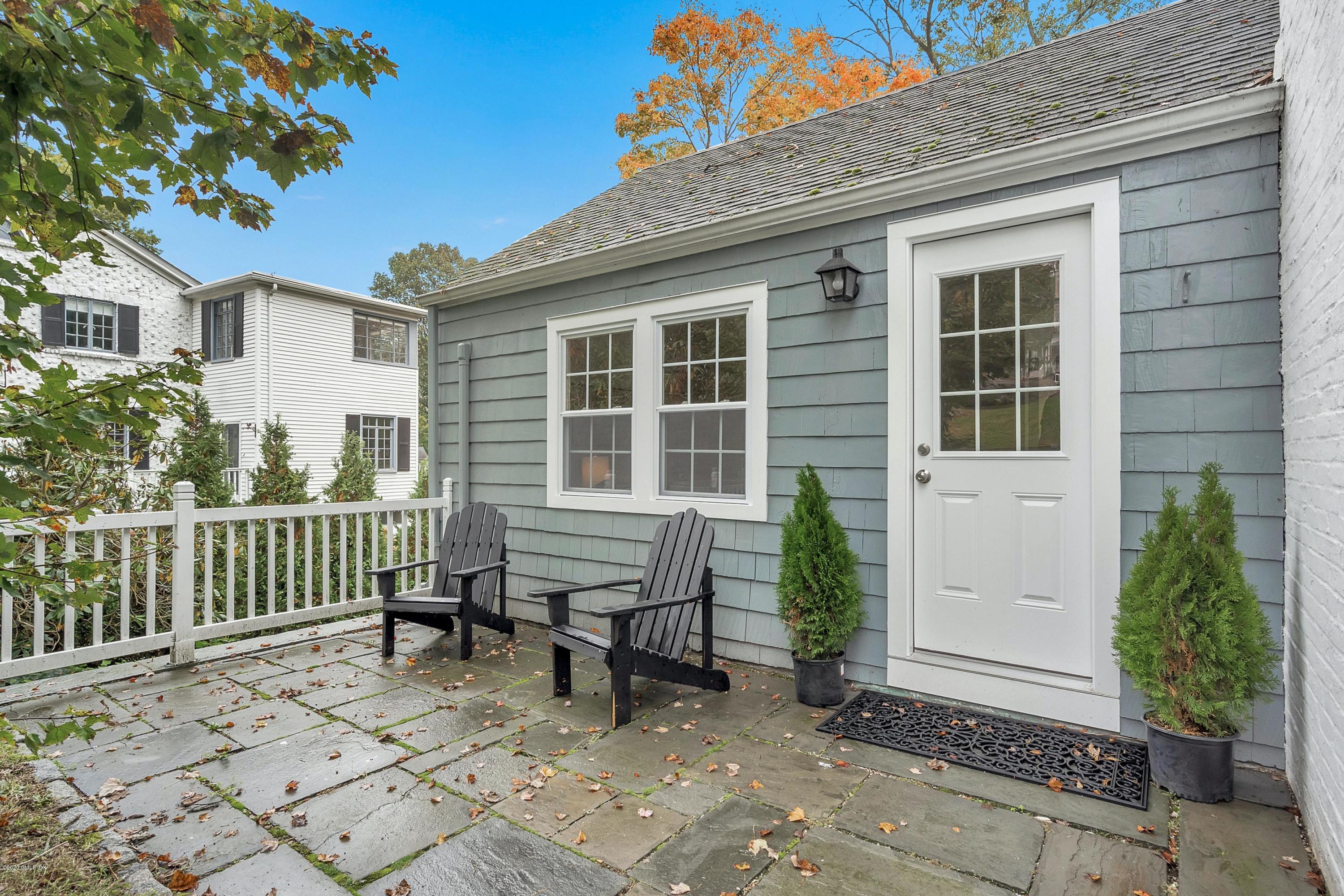 36 Crescent Road Riverside, CT 06878 - Photo 3 of 44 a view of a house with a bench in a patio
