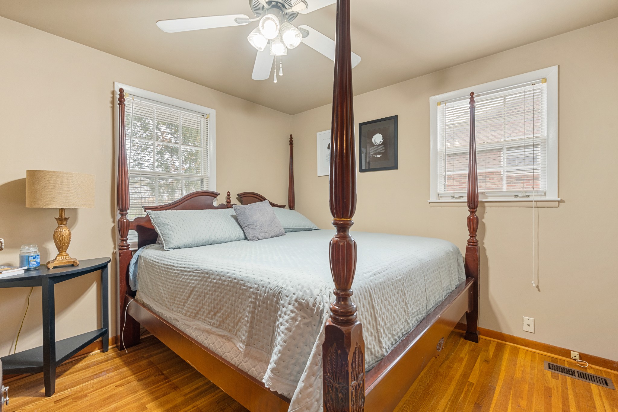 612 Canton Pass Madison, TN 37115 - Photo 11 of 24 a bedroom with a bed and wooden floor