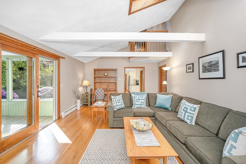 16 Haystack Road Reading, MA 01867 - Photo 12 of 42 a living room with furniture and a large window