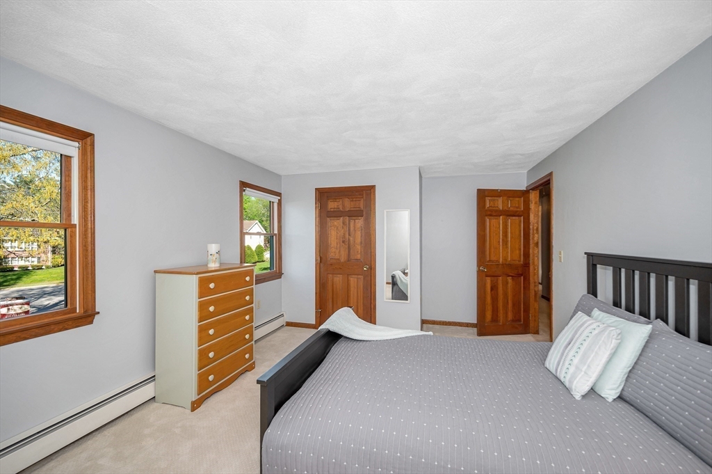 16 Haystack Road Reading, MA 01867 - Photo 23 of 42 a bedroom with furniture and window