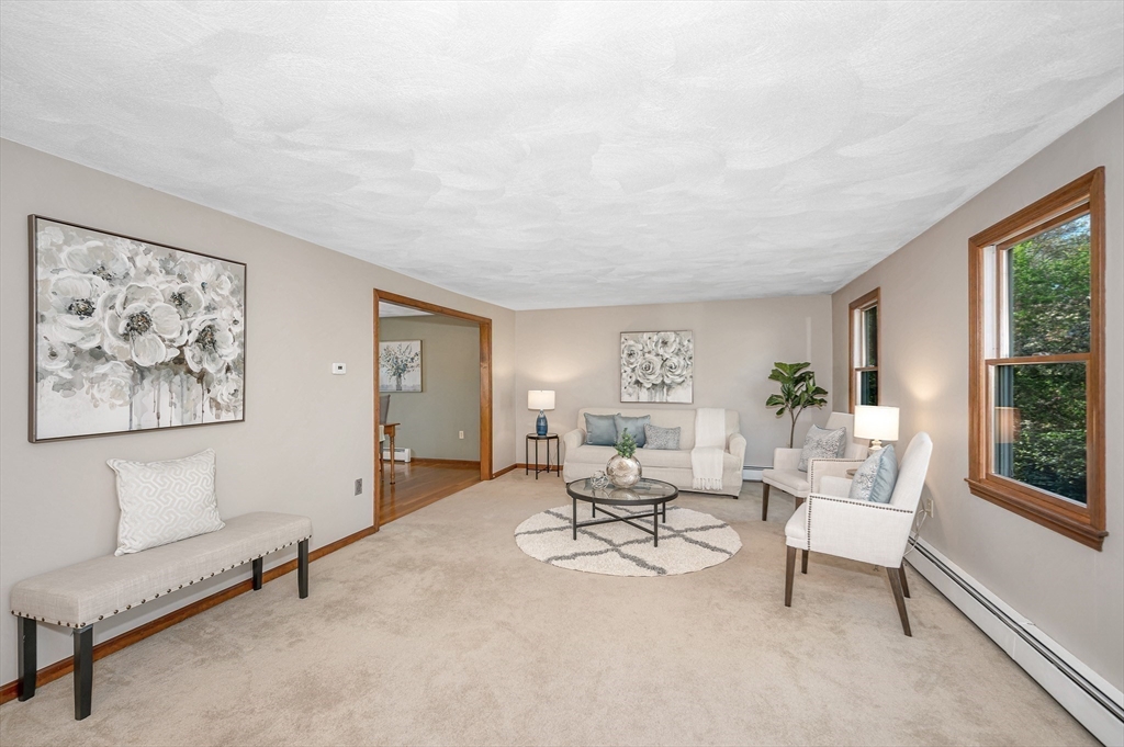 16 Haystack Road Reading, MA 01867 - Photo 3 of 42 a living room with furniture and a window