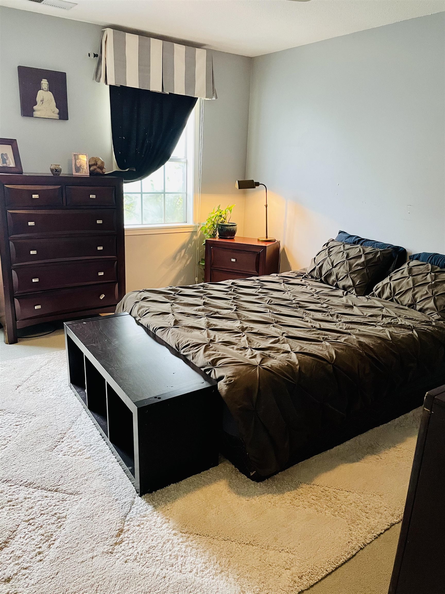 5720 Quince Road, Unit 1 Memphis, TN 38119 - Photo 15 of 18 a bedroom with a bed and window