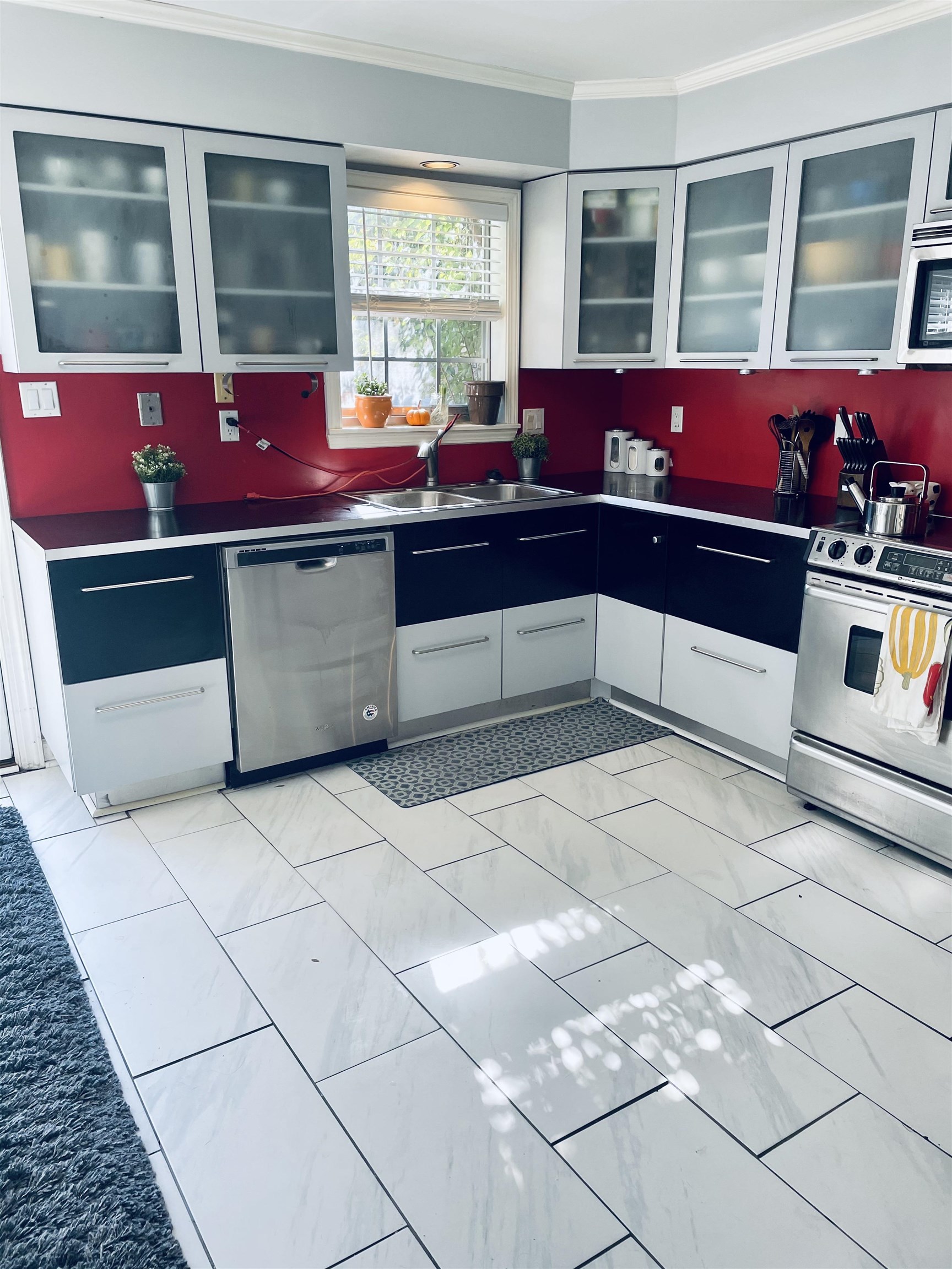 5720 Quince Road, Unit 1 Memphis, TN 38119 - Photo 5 of 18 a view of kitchen with stainless steel appliances kitchen island granite countertop a stove a sink and a cabinets