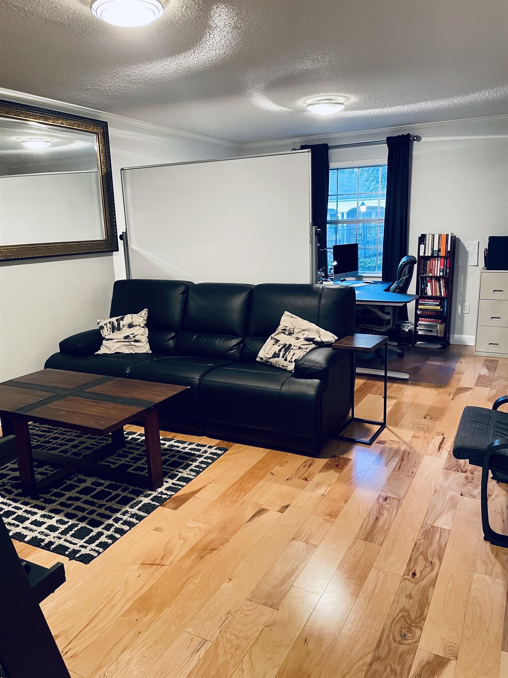 5720 Quince Road, Unit 1 Memphis, TN 38119 - Photo 9 of 18 a living room with furniture and a flat screen tv
