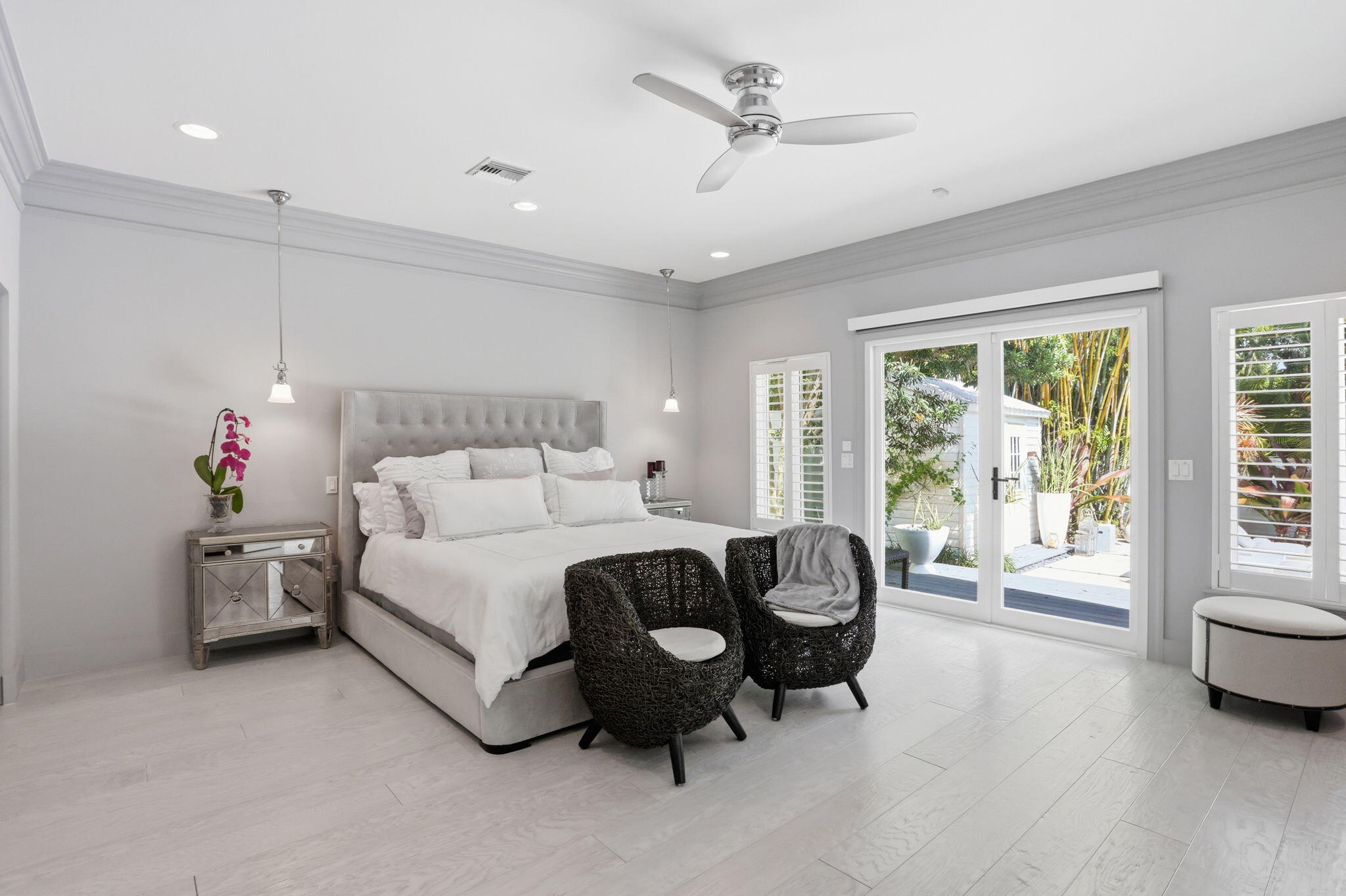 309 Northeast 8th Avenue Delray Beach, FL 33483 - Photo 19 of 43 a spacious bedroom with a bed and a couch