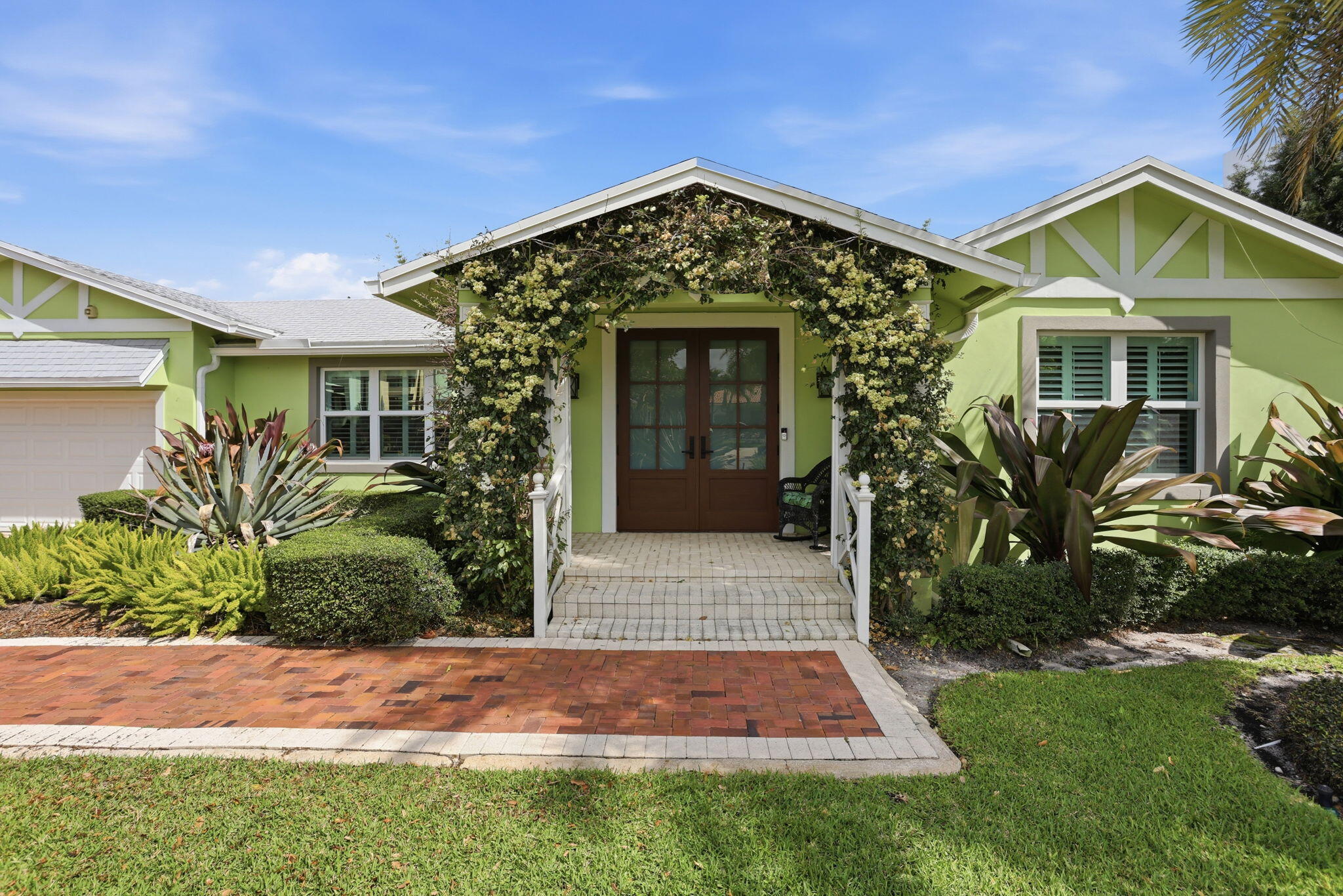 309 Northeast 8th Avenue Delray Beach, FL 33483 - Photo 2 of 43 a front view of a house