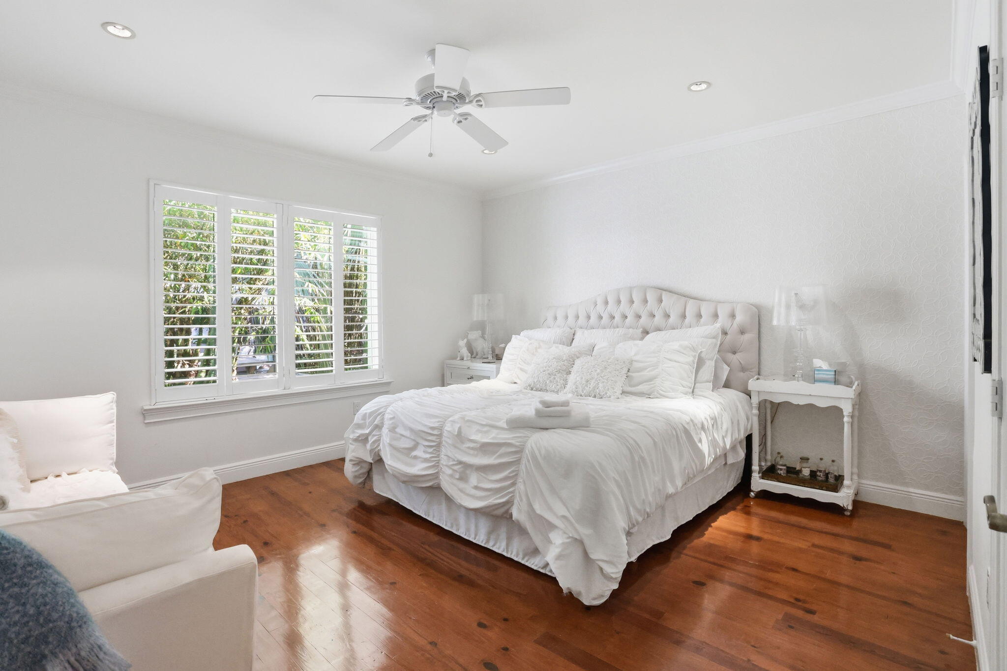 309 Northeast 8th Avenue Delray Beach, FL 33483 - Photo 25 of 43 a spacious bedroom with a bed and a window