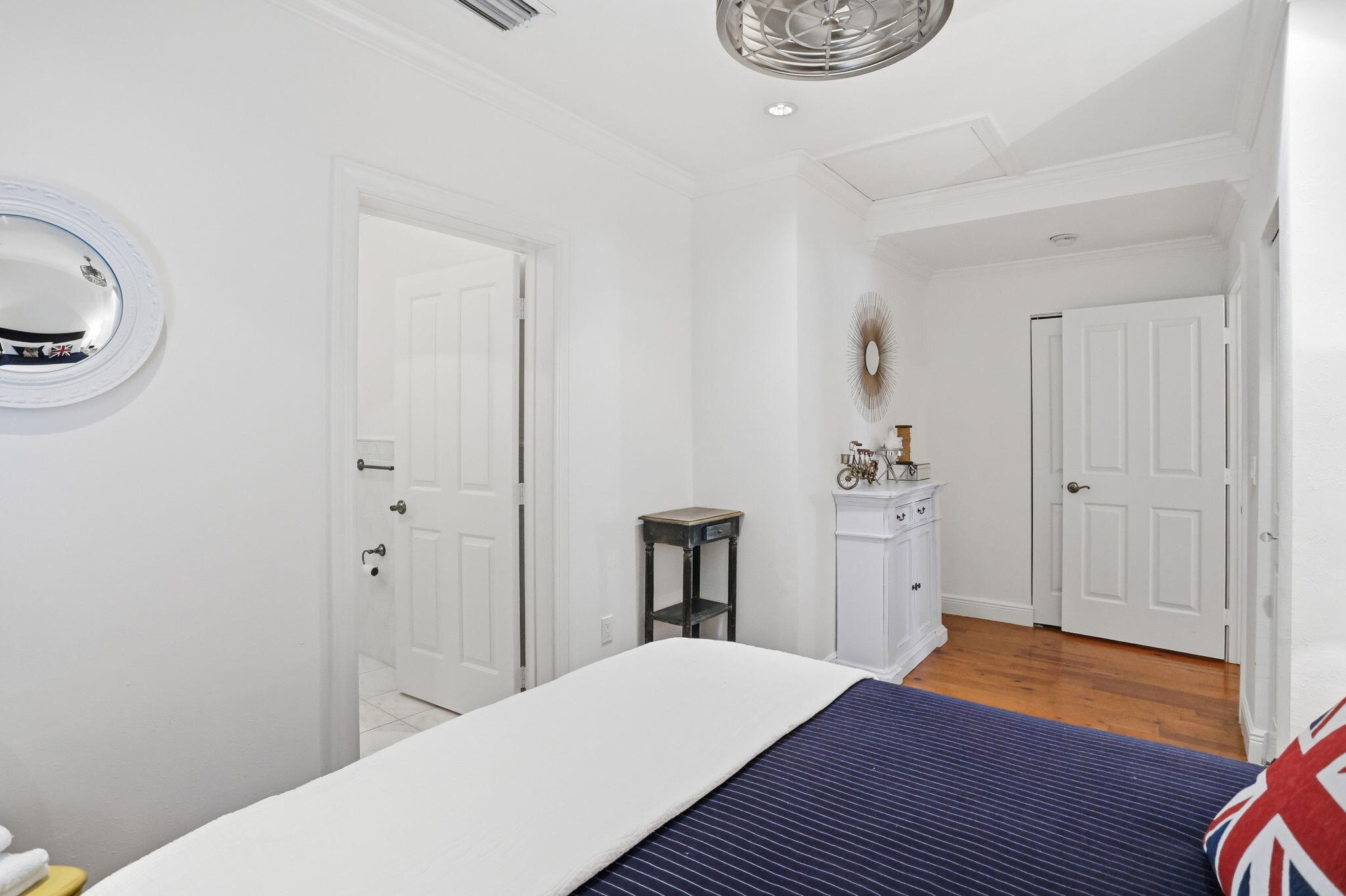 309 Northeast 8th Avenue Delray Beach, FL 33483 - Photo 29 of 43 a bedroom with a bed and a table
