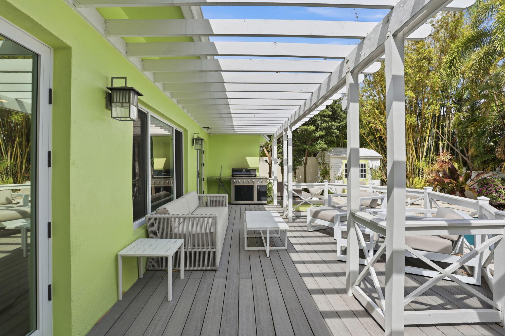 309 Northeast 8th Avenue Delray Beach, FL 33483 - Photo 34 of 43 a view of balcony with chairs and wooden floor