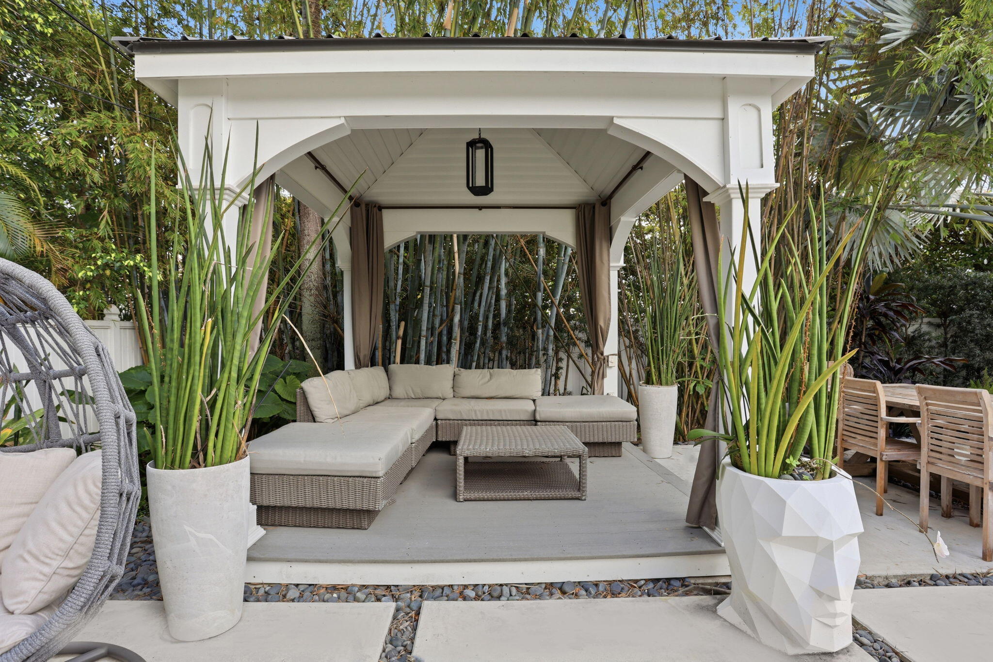 309 Northeast 8th Avenue Delray Beach, FL 33483 - Photo 35 of 43 a view of a couches in the patio