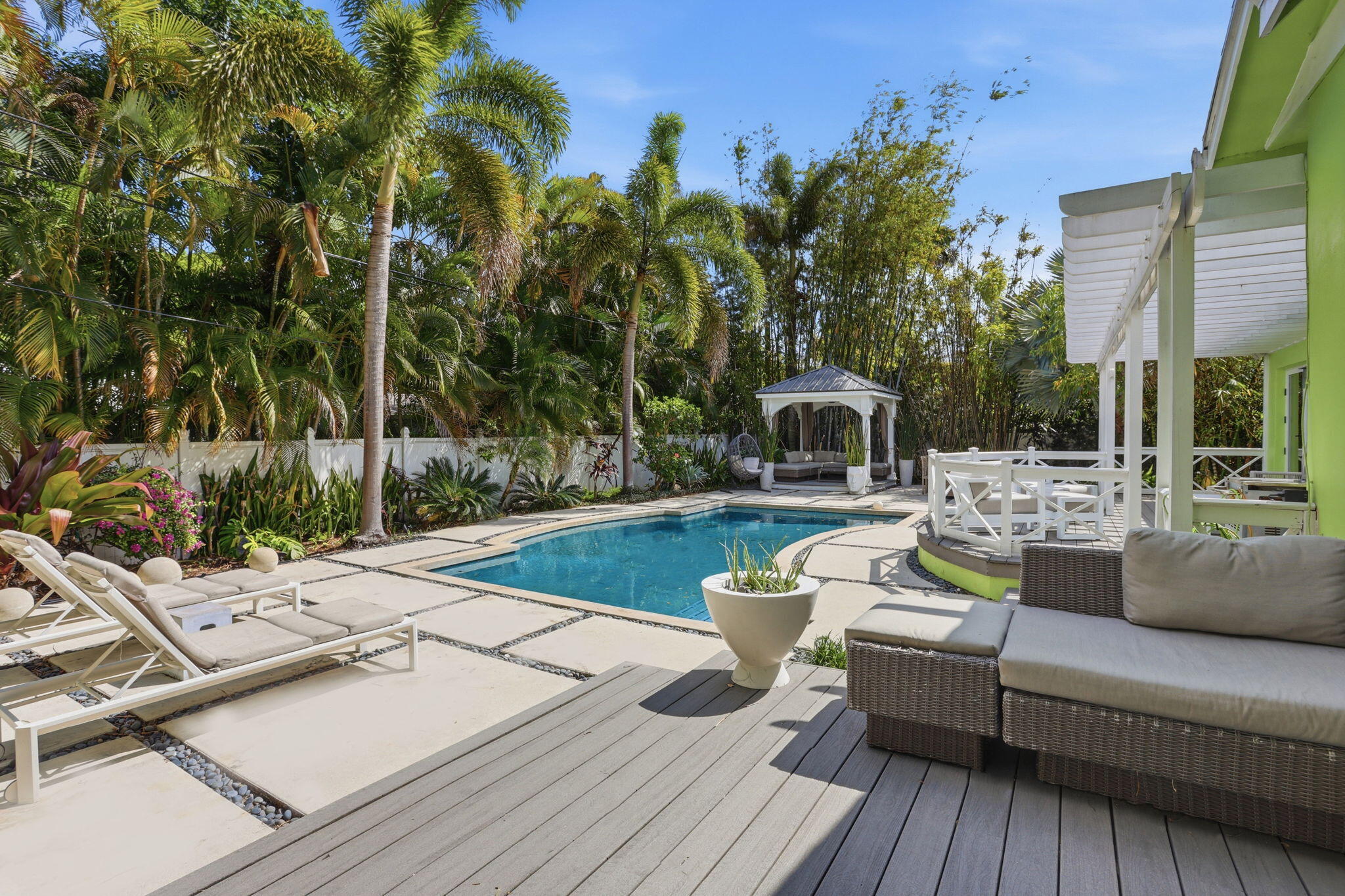 309 Northeast 8th Avenue Delray Beach, FL 33483 - Photo 39 of 43 a view of a patio with couches and potted plants