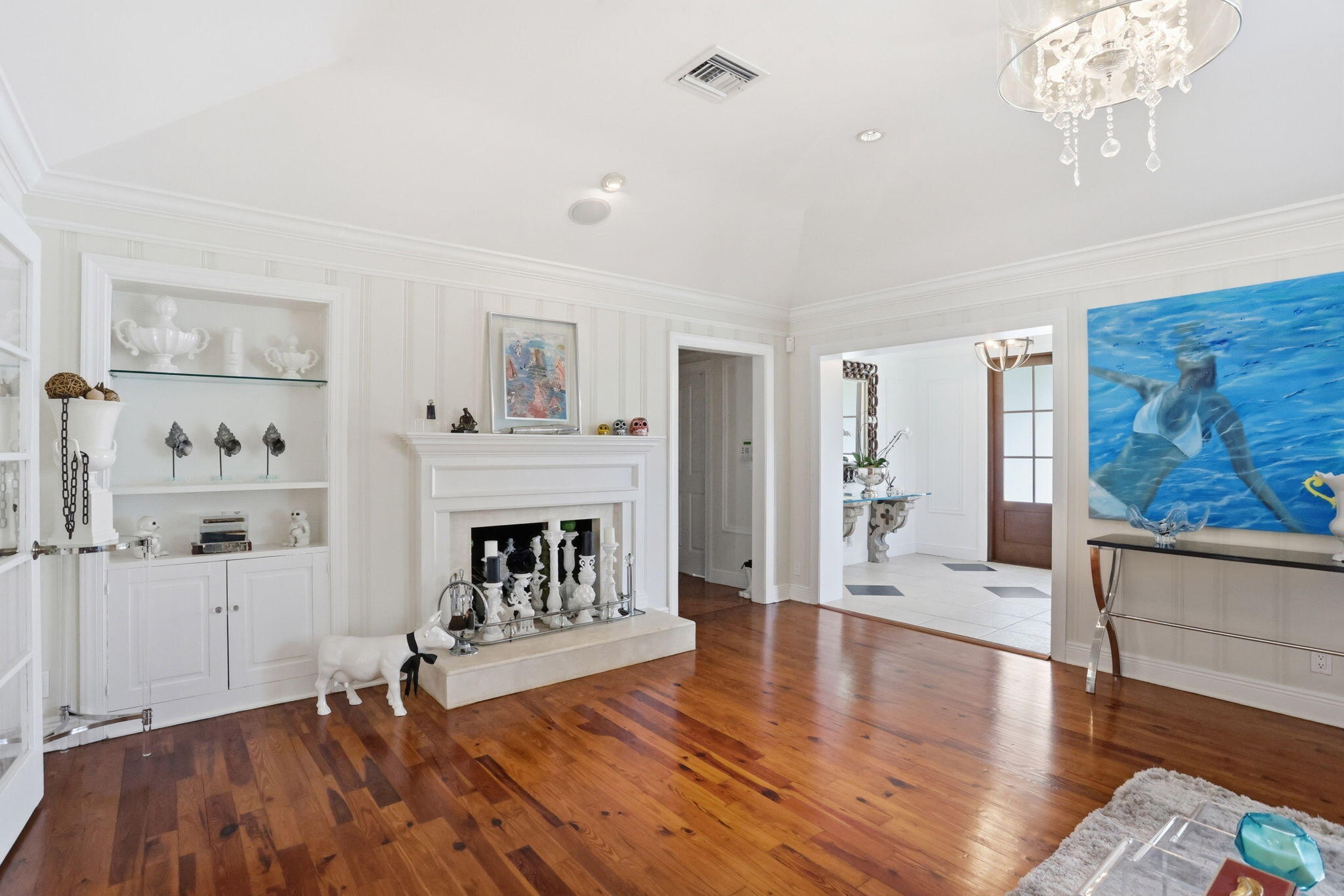 309 Northeast 8th Avenue Delray Beach, FL 33483 - Photo 7 of 43 a view of a livingroom with wooden floor and a fireplace