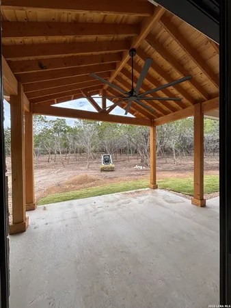 a view of a room with wooden floor and pool