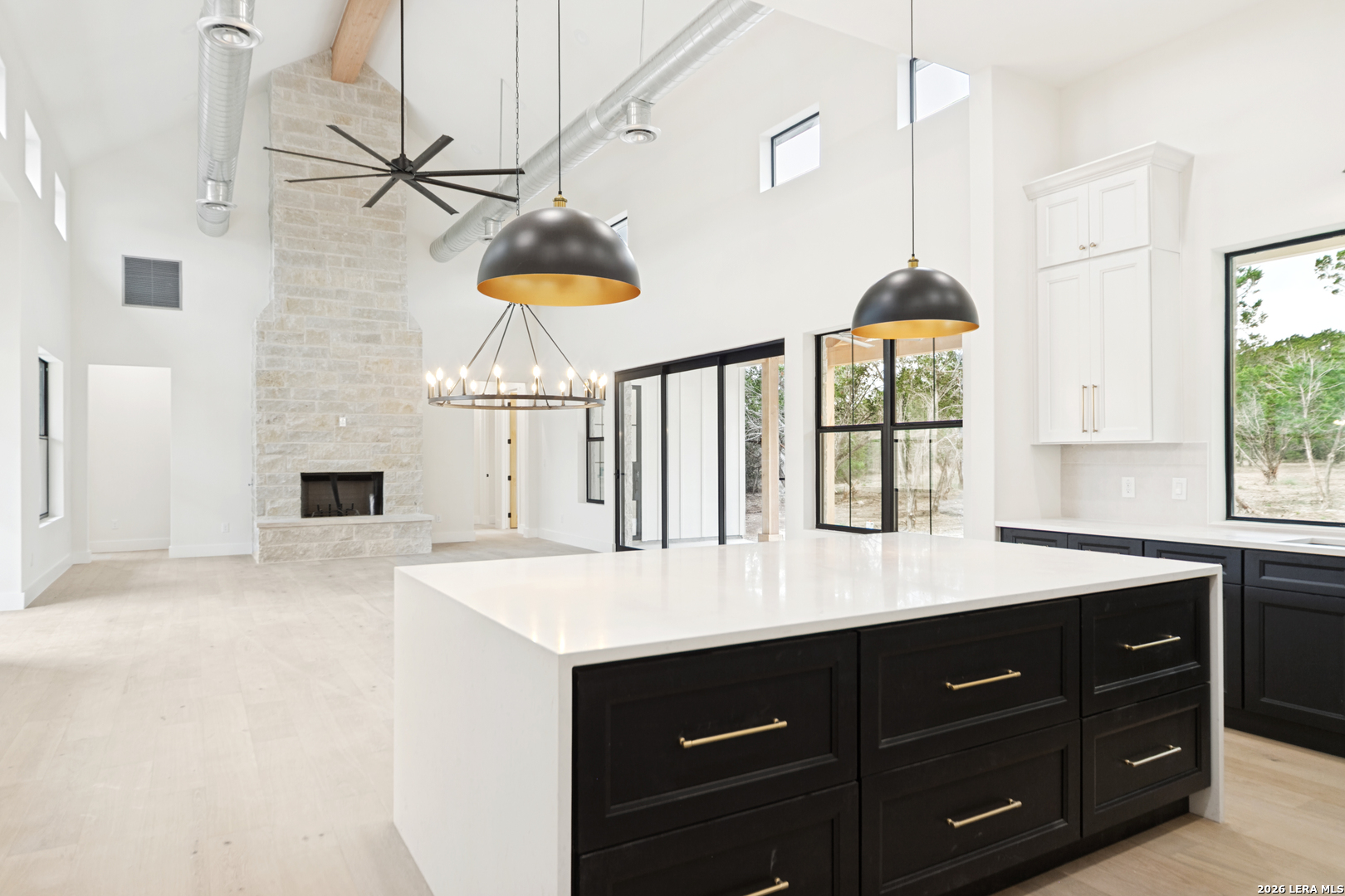 129 Aermotor Lane Boerne, TX 78006 - Photo 12 of 25 a kitchen with a sink cabinets and a window
