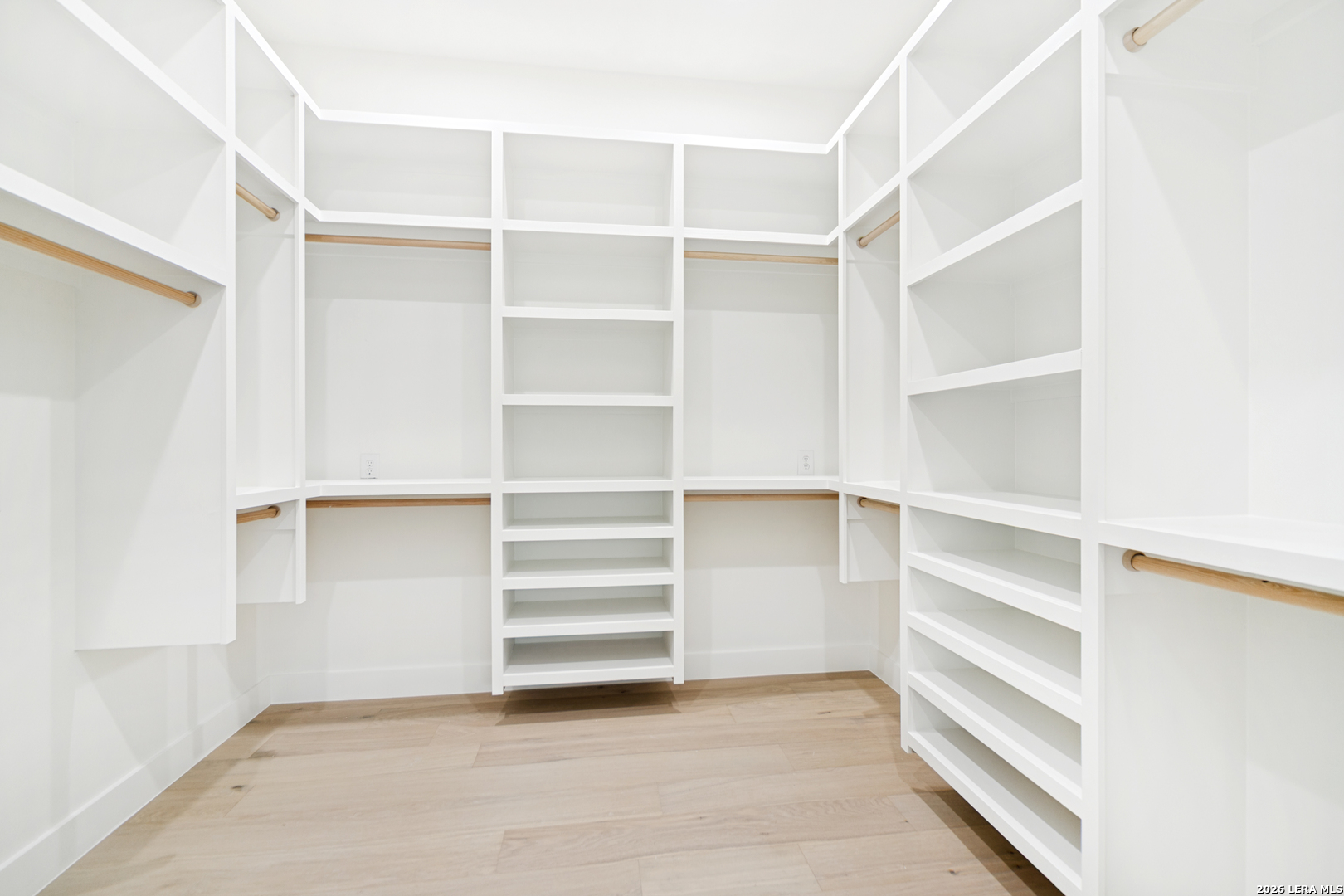 129 Aermotor Lane Boerne, TX 78006 - Photo 17 of 25 a view of walk in closet with empty racks