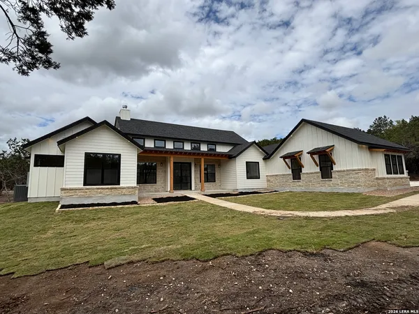 a house view with a garden space