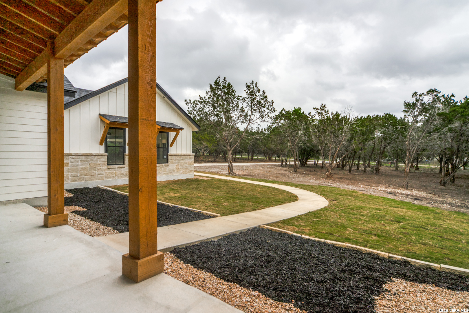 129 Aermotor Lane Boerne, TX 78006 - Photo 4 of 25 a view of a swimming pool with a patio