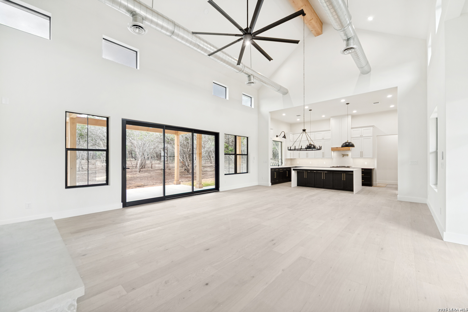 129 Aermotor Lane Boerne, TX 78006 - Photo 9 of 25 a view of an empty room with a window