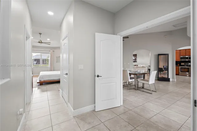 a view of kitchen with furniture and outdoor space