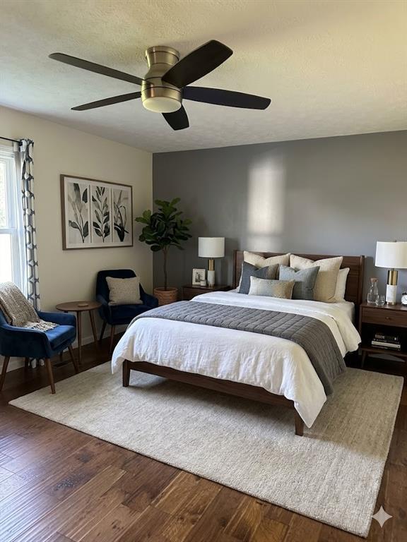 27 Carriage Trace Southeast Cartersville, GA 30121 - Photo 22 of 26 a bedroom with bed and a chandelier