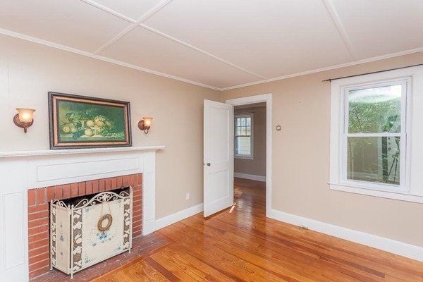9 Blueberry Road Wareham, MA 02558 - Photo 8 of 23 a view of an empty room with wooden floor and a window