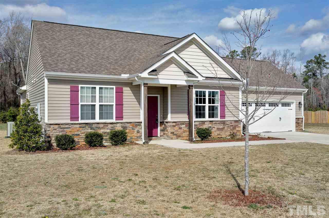 Beautiful ranch style home with covered front porch.  Easy access to highways.  No HOA dues.