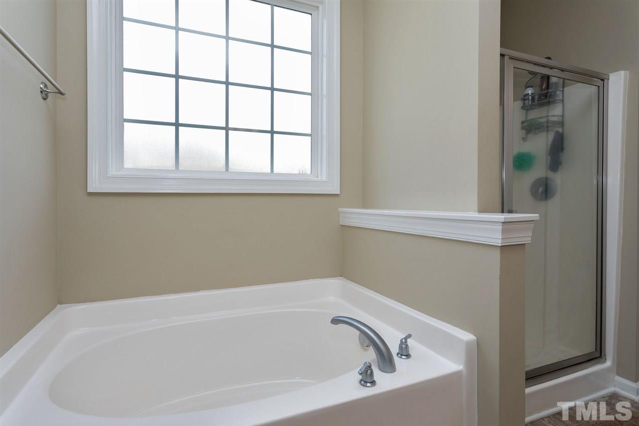 7998 Creech Road Middlesex, NC 27557 - Photo 12 of 18 Privacy window allows natural light to come into the room.
