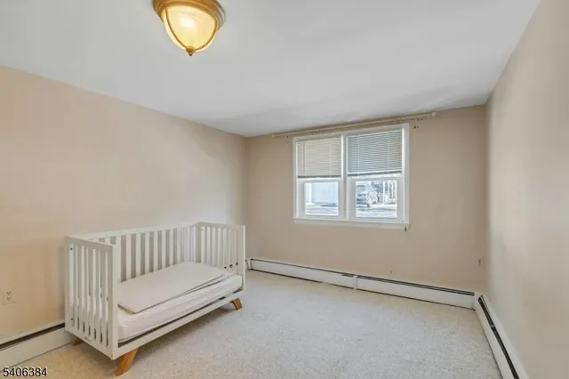 a view of room with stairs and a window