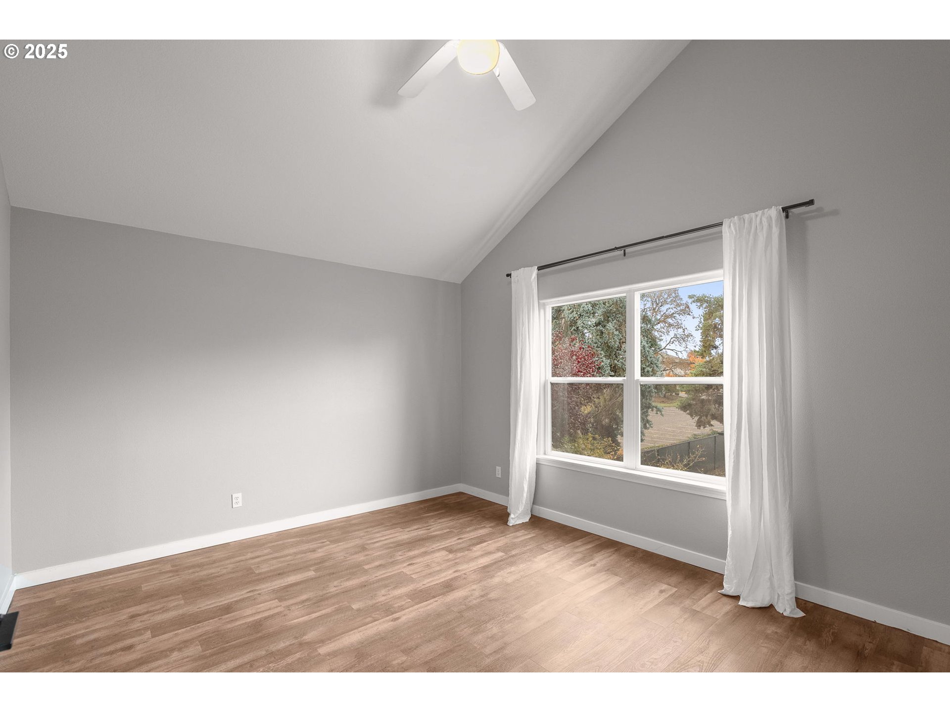 3255 Southwest 179th Terrace Beaverton, OR 97003 - Photo 22 of 38 a view of an empty room with a window