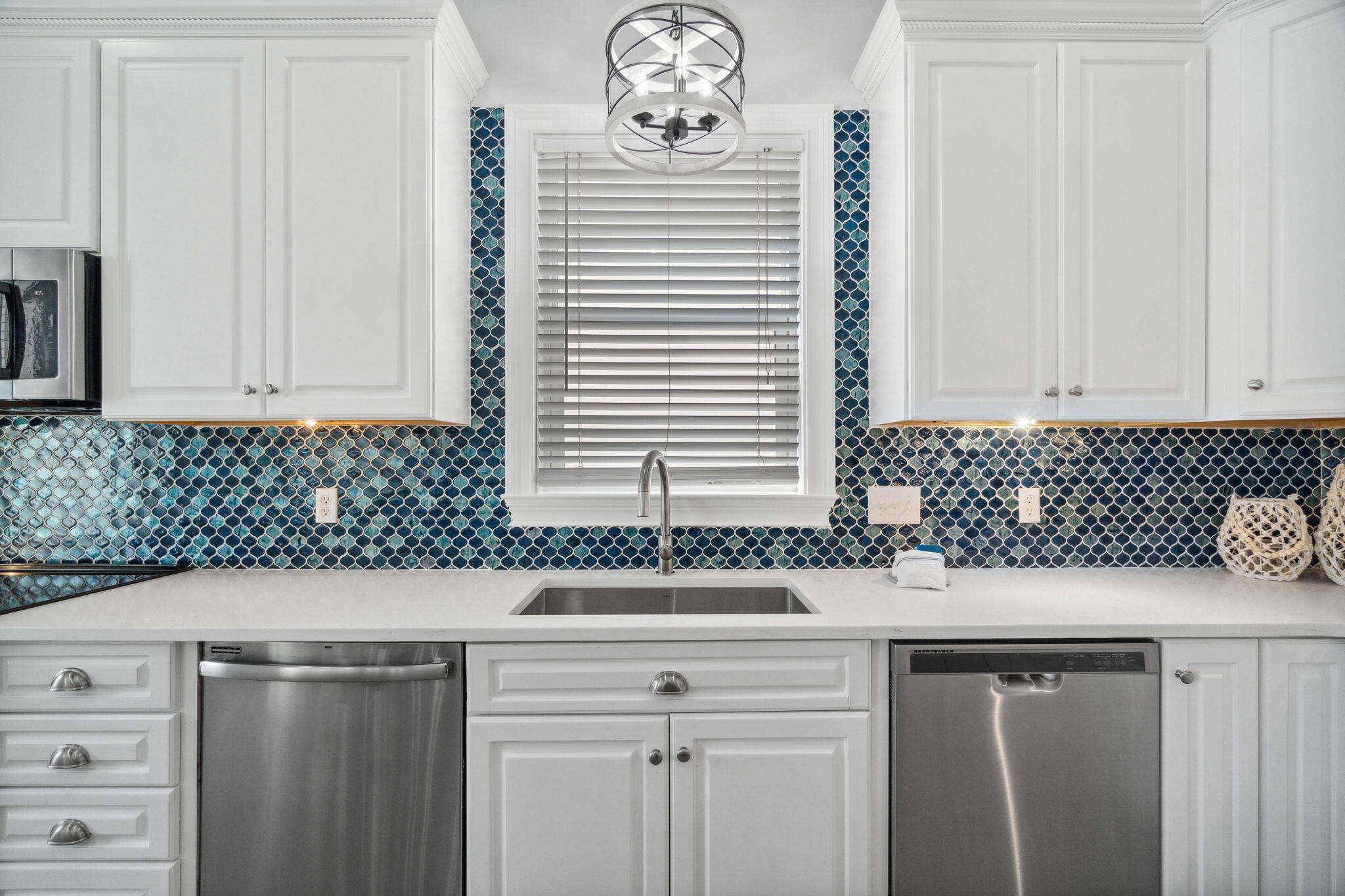 29 Sarasota Street Miramar Beach, FL 32550 - Photo 17 of 66 a kitchen with a sink and cabinets