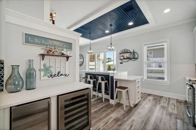 a view of a livingroom with wooden floor
