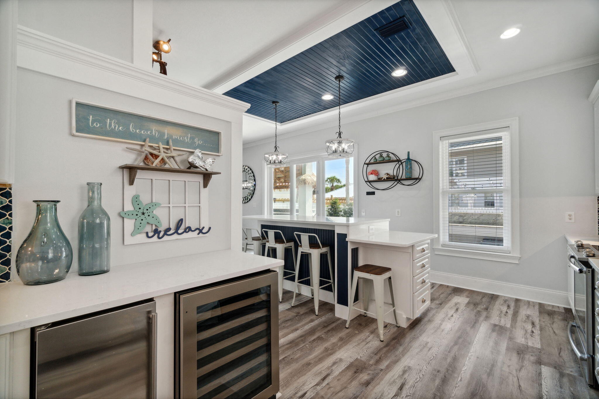 29 Sarasota Street Miramar Beach, FL 32550 - Photo 18 of 66 a kitchen with sink cabinets and wooden floor