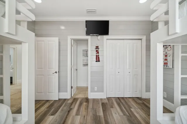 a bathroom with a granite countertop sink a toilet and shower