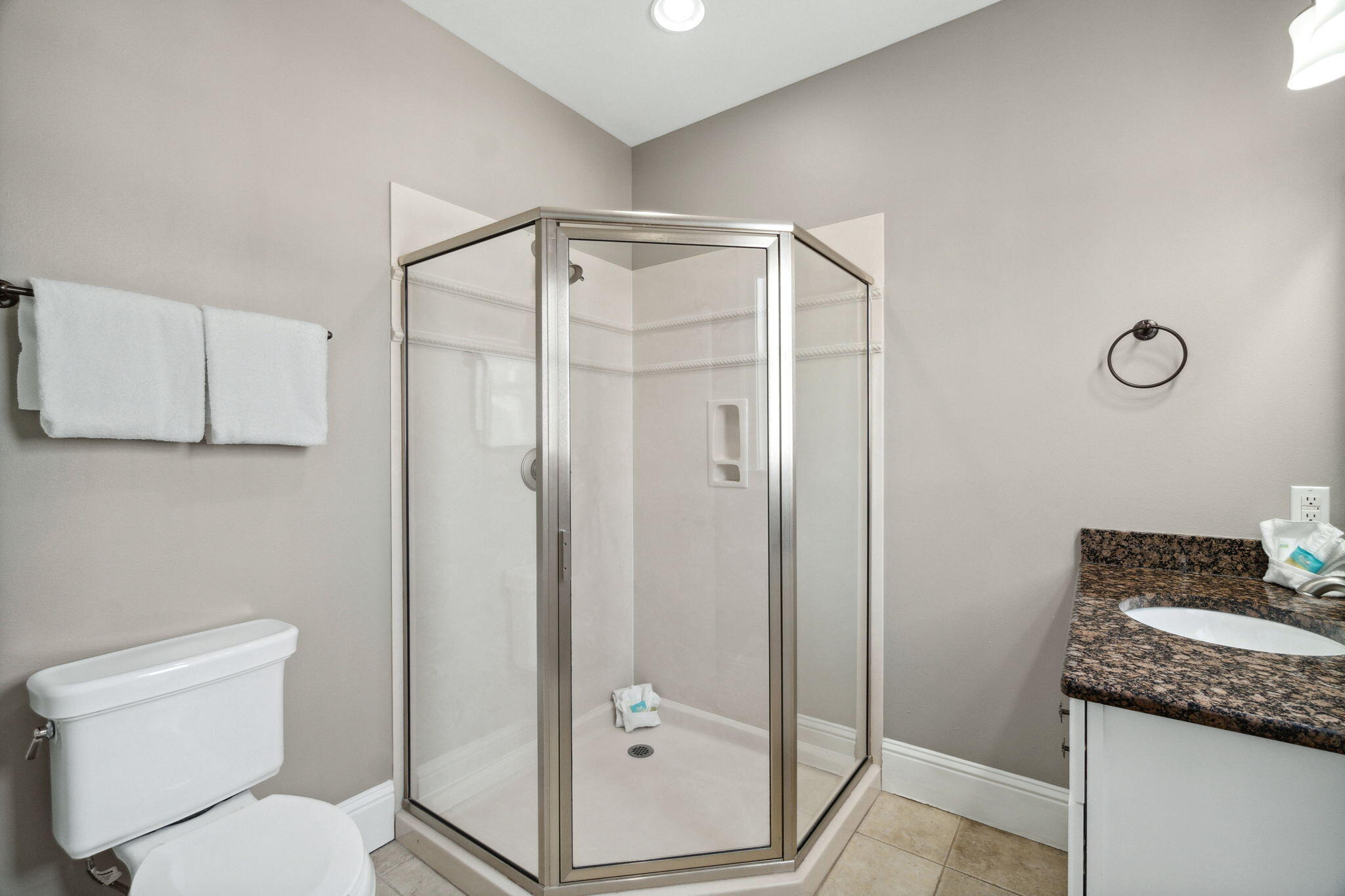 29 Sarasota Street Miramar Beach, FL 32550 - Photo 26 of 66 a bathroom with a granite countertop sink a toilet and shower