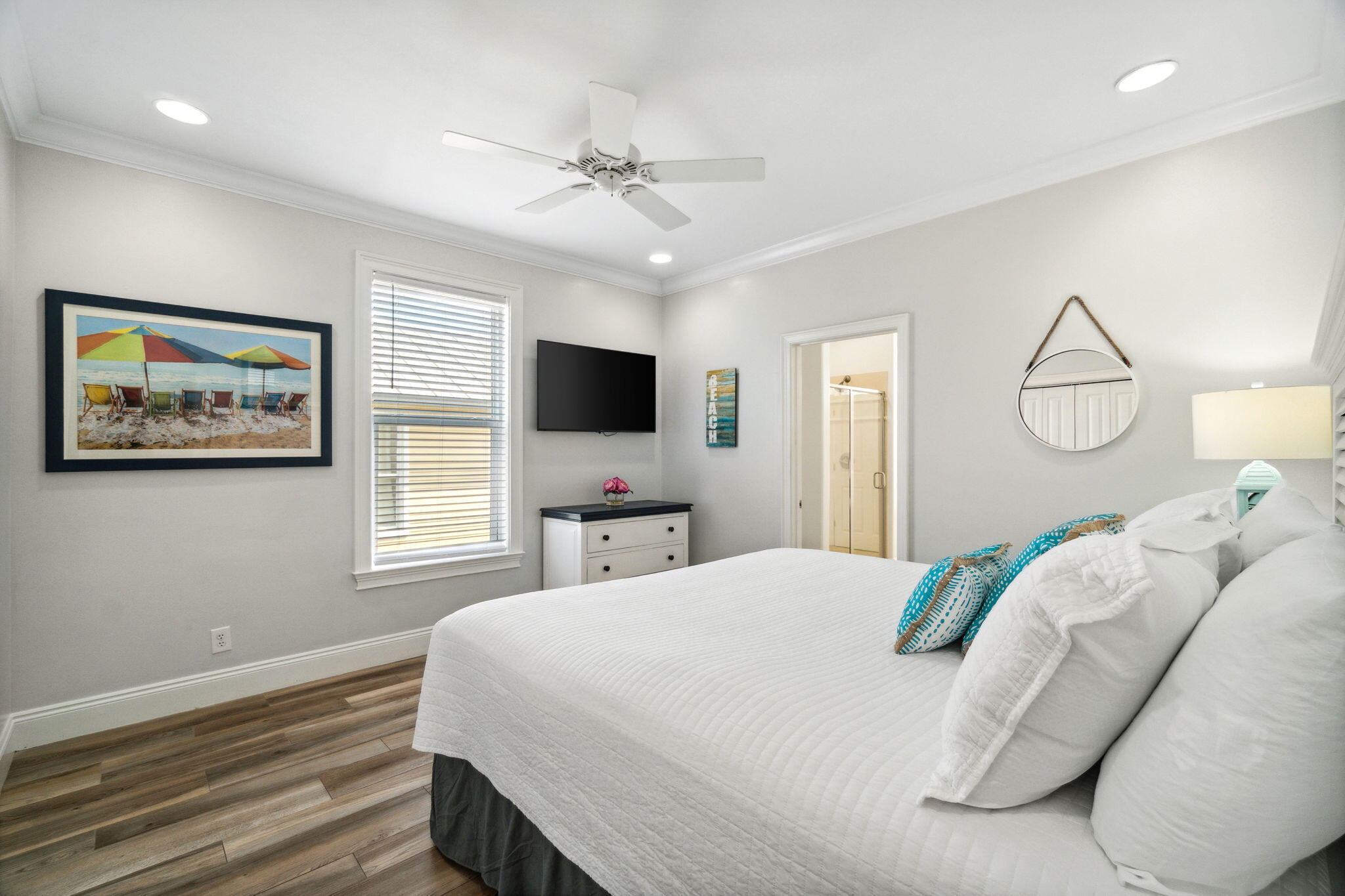 29 Sarasota Street Miramar Beach, FL 32550 - Photo 27 of 66 a bedroom with a bed a window and a flat screen tv