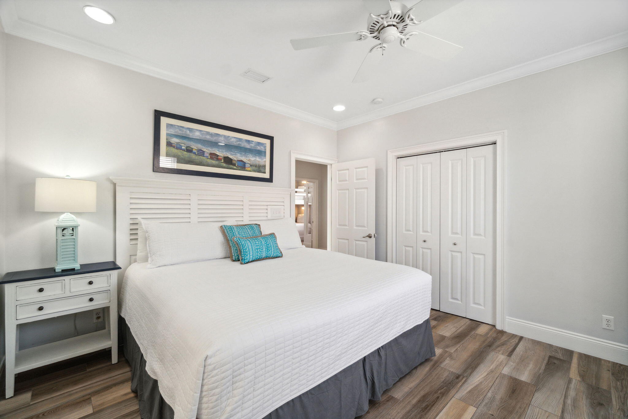 29 Sarasota Street Miramar Beach, FL 32550 - Photo 28 of 66 a bedroom with a bed and a chandelier