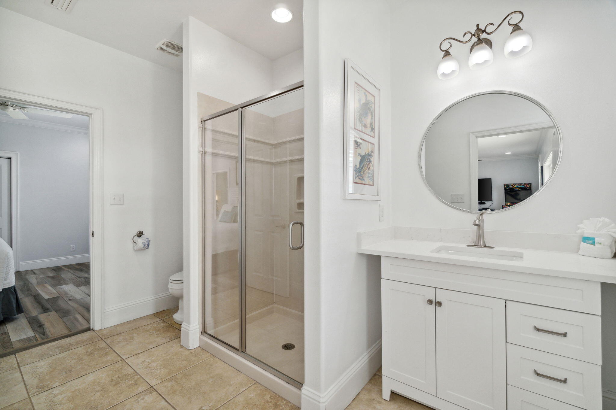 29 Sarasota Street Miramar Beach, FL 32550 - Photo 29 of 66 a en suite bathroom with a double vanity sink and a mirror