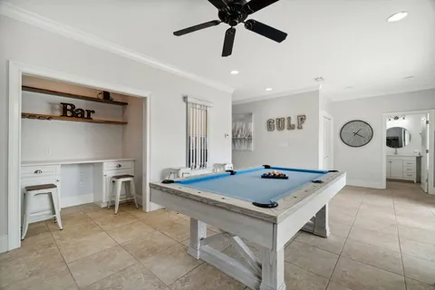 a bedroom with a bed and a flat screen tv in it