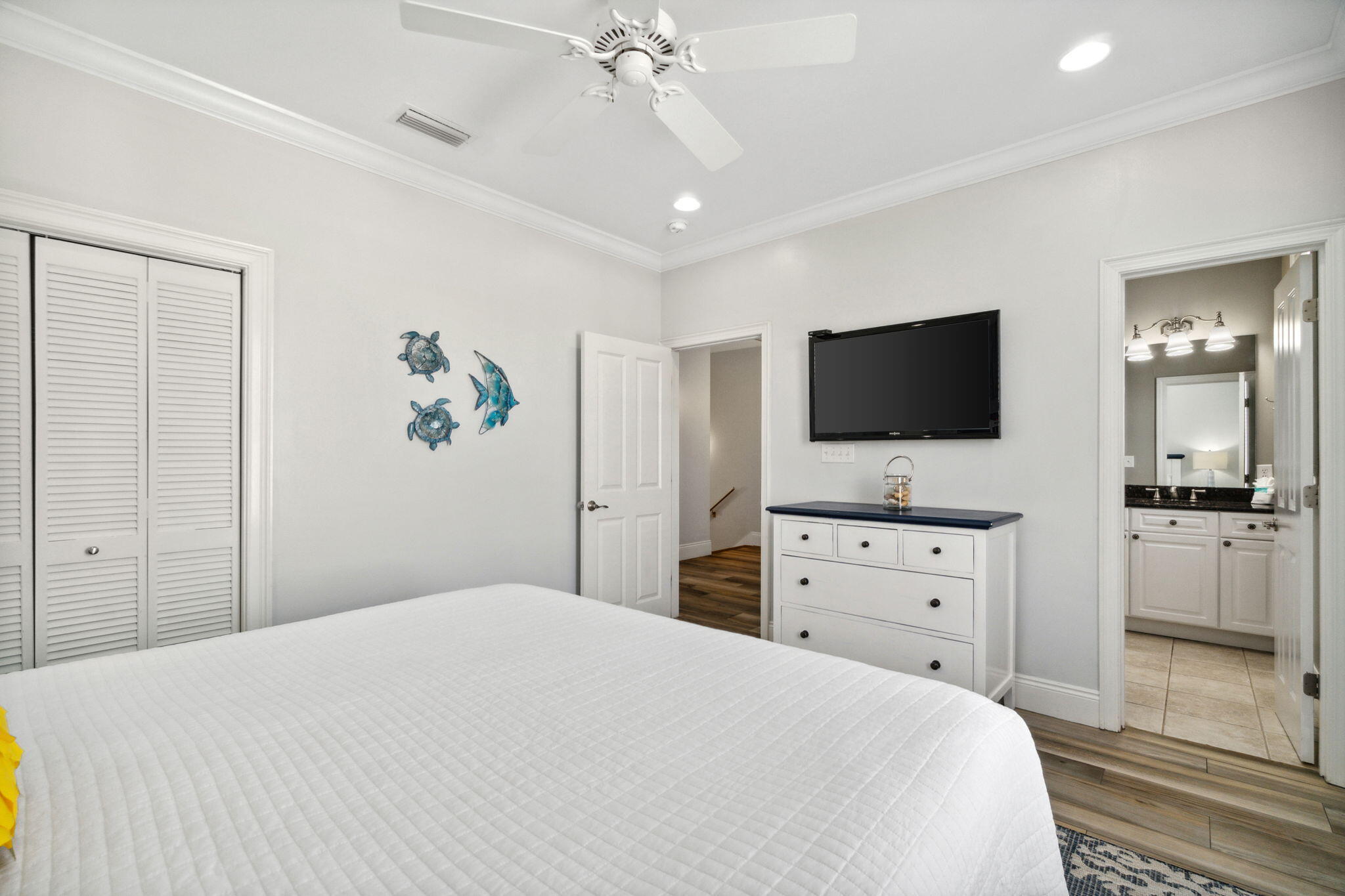 29 Sarasota Street Miramar Beach, FL 32550 - Photo 37 of 66 a bedroom with a bed and a flat screen tv in it