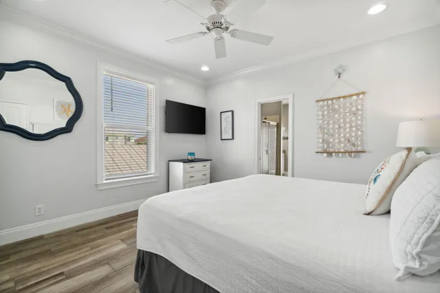 a bathroom with a granite countertop sink a toilet and a mirror